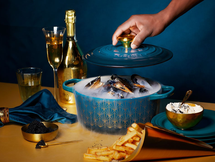 In Sekt-Vanille-Creme pochierte Muscheln mit Kaviar-Pommes-Frites